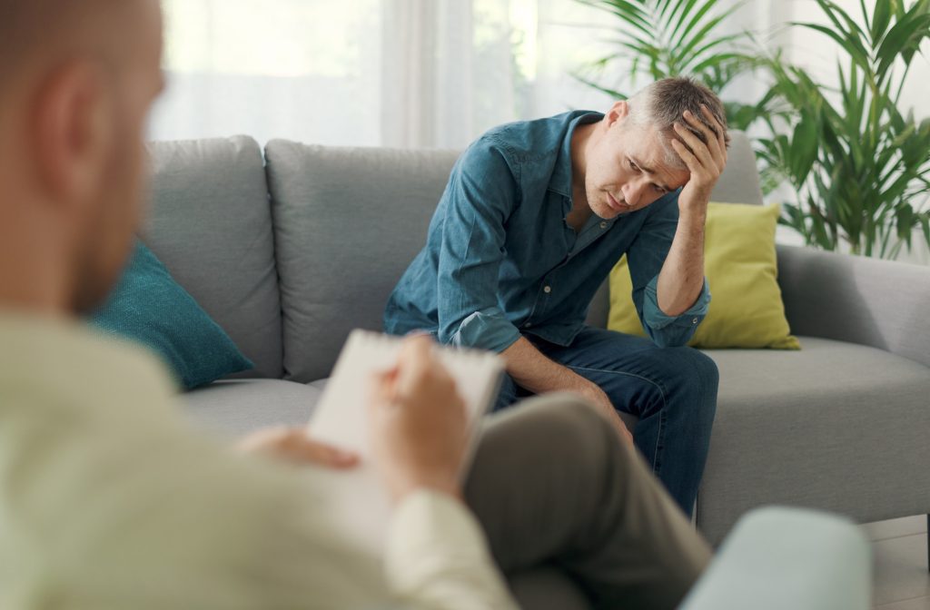 Depressed patient talking with a therapist